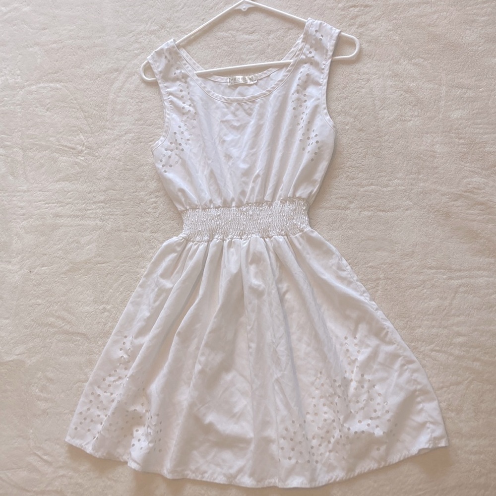 Women’s dress- (says a size large on tag but more like a medium) white dress,
